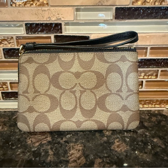 NEVER WORN Coach Wristlet with Dinosaur Design - Picture 3 of 4